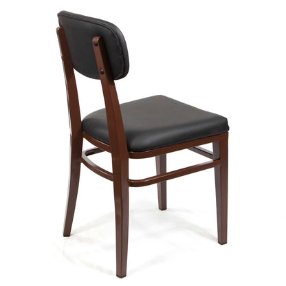 A modern dining chair with a dark brown wooden frame and black faux leather upholstery on the seat and backrest, shown from a three-quarter angle on a white background.