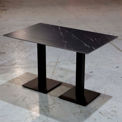 black sintered stone restaurant tables