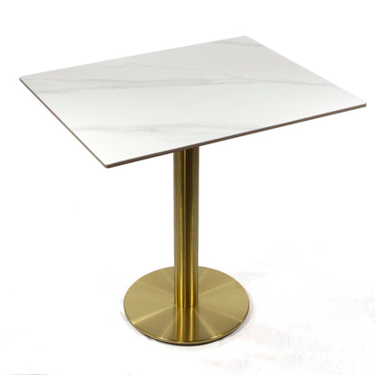 white sintered stone restaurant tables, with gold color base