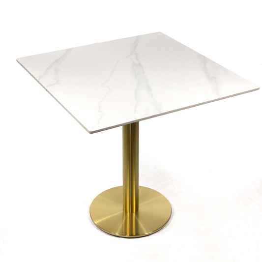 white sintered stone restaurant tables