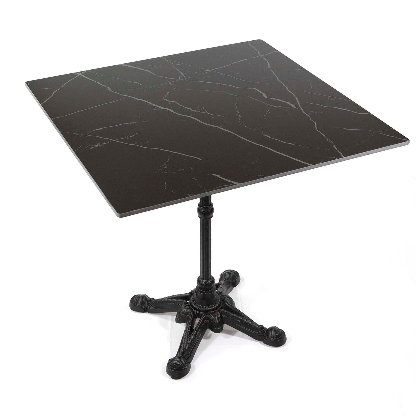 Black marble table with a cast iron base on a white background