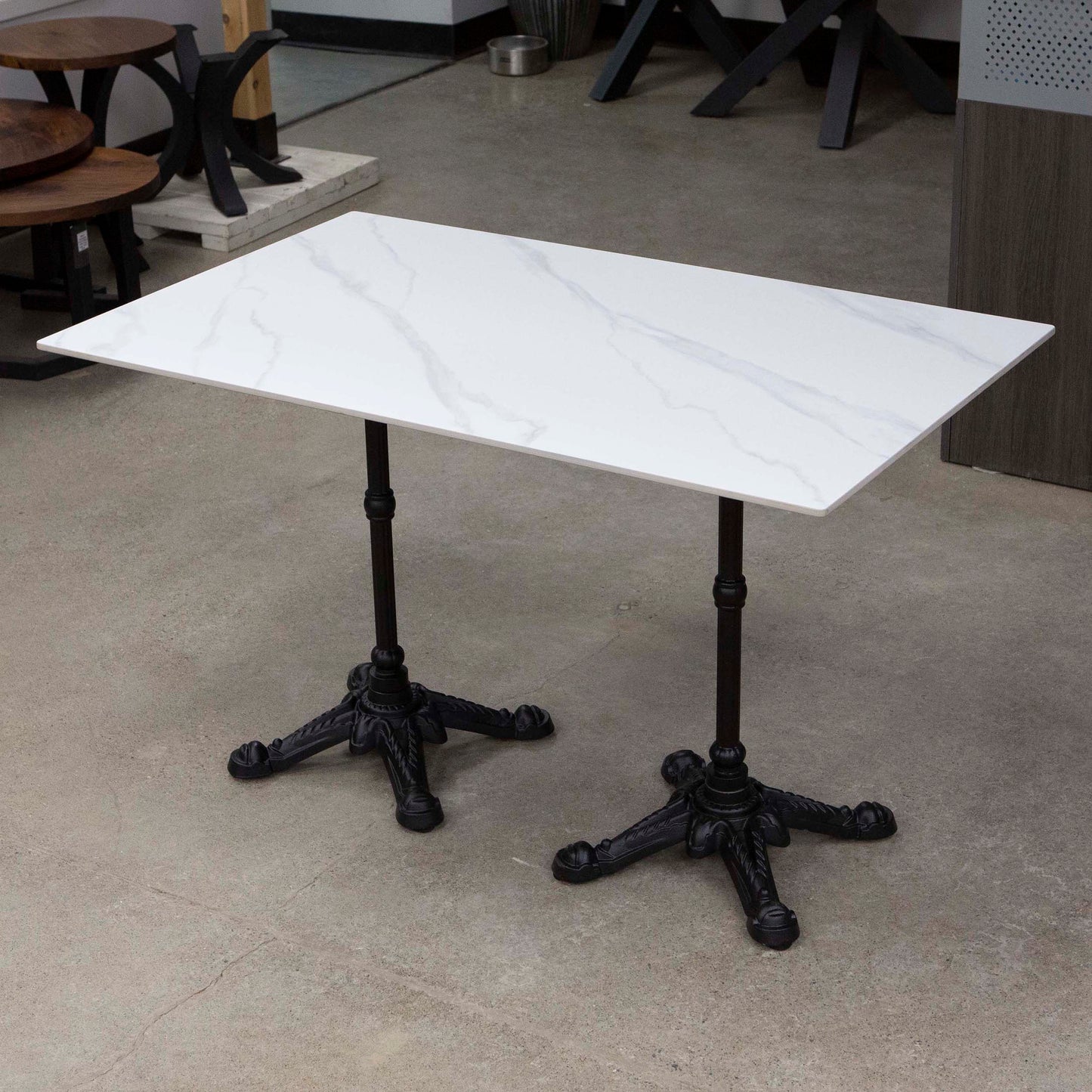 white sintered stone restaurant tables