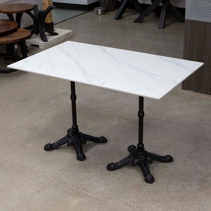 white sintered stone restaurant tables