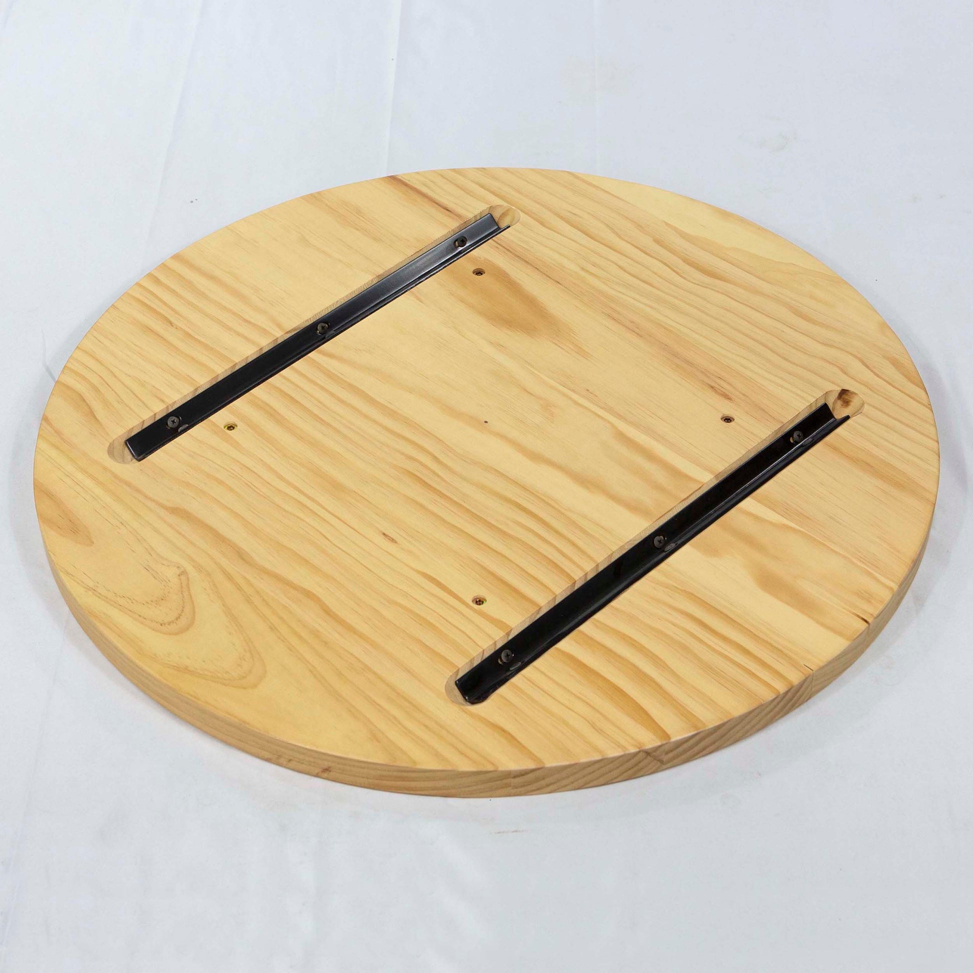 back side of round solid pine table tops
