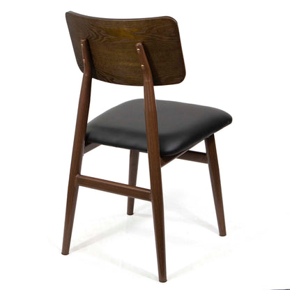 A mid-century modern dining chair with a dark brown wood frame, a curved backrest, and a black upholstered seat cushion, shown from a three-quarters angle on a white background.