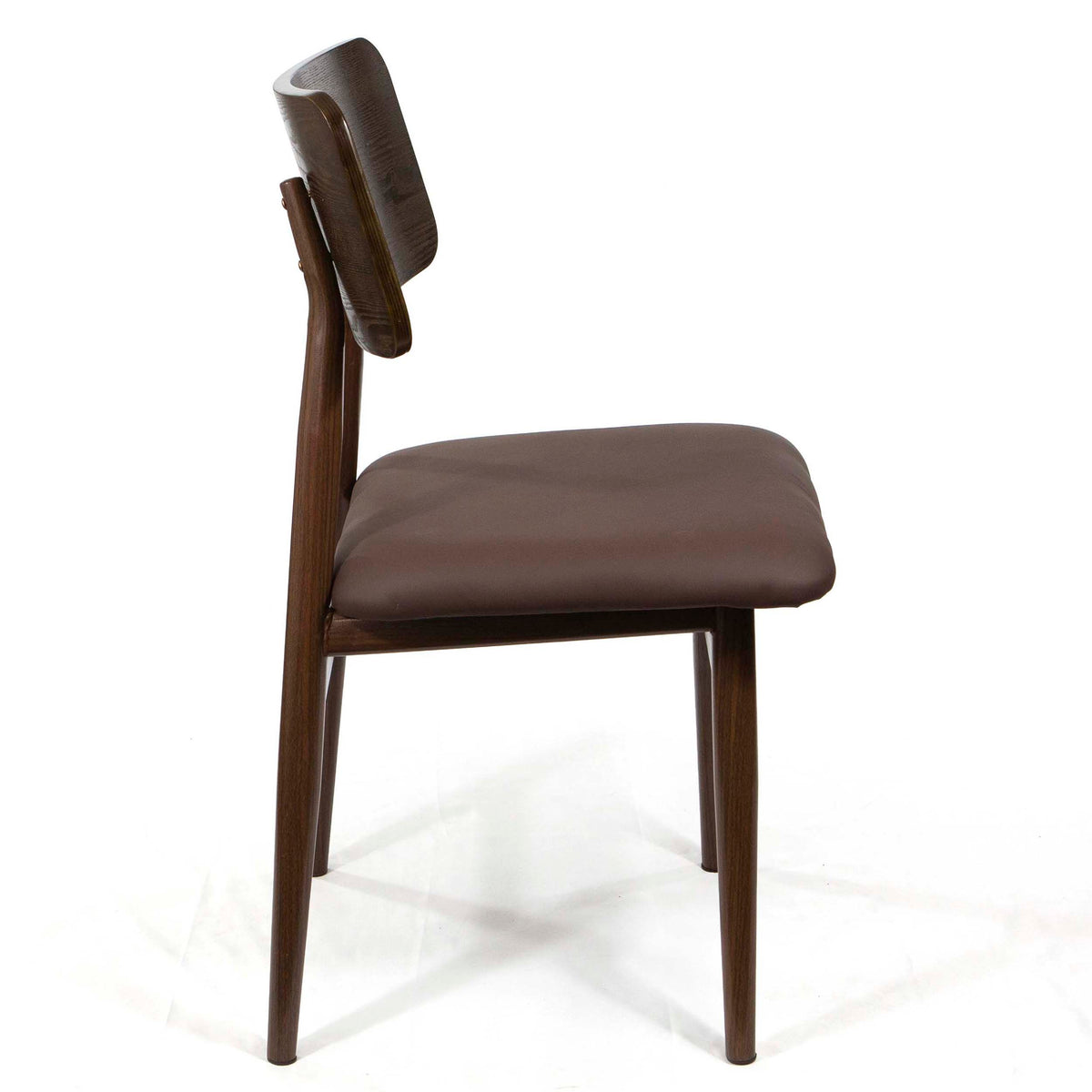 A mid-century modern dining chair with a dark brown upholstered seat and backrest on a dark wood frame, shown from a side profile against a white background.