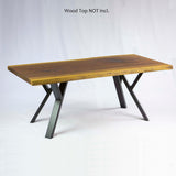 a coffee table with black Y-shaped metal legs