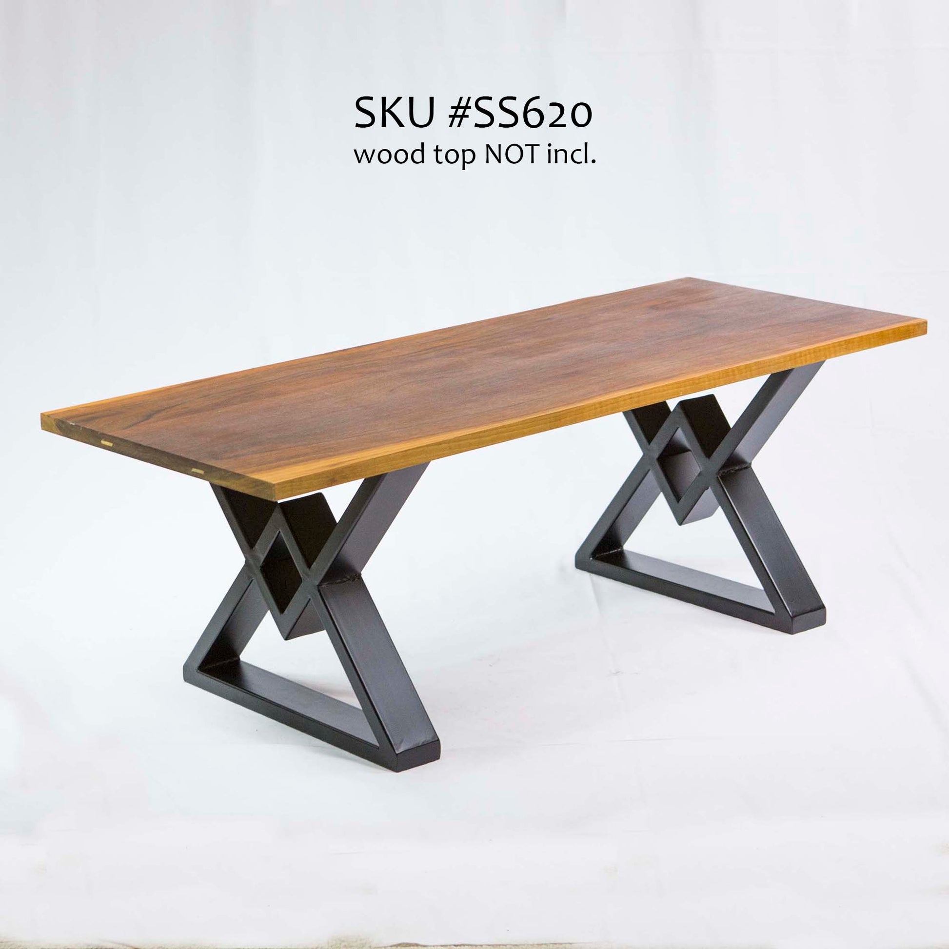 a coffee table with diamond-shaped black metal legs