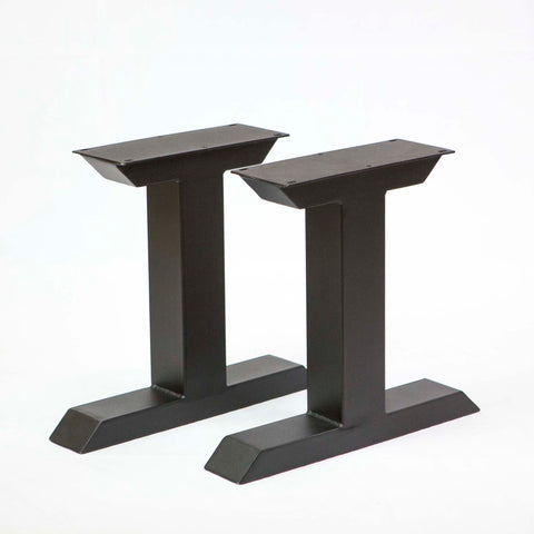 a pair of black T-shaped metal legs for coffee table